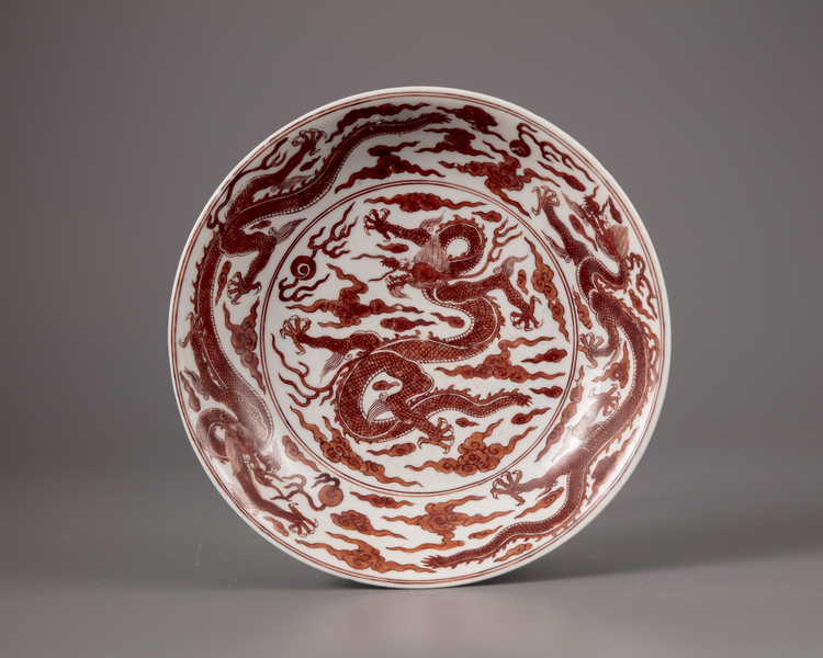 A Chinese iron-red-decorated 'dragon' dish