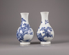 A pair of Chinese blue and white crackle-glazed vases