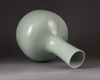 A large Chinese celadon-glazed moulded bottle vase