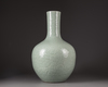 A large Chinese celadon-glazed moulded bottle vase