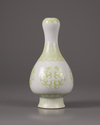 A Chinese lime-green-enamelled 'kui dragons' garlic neck vase