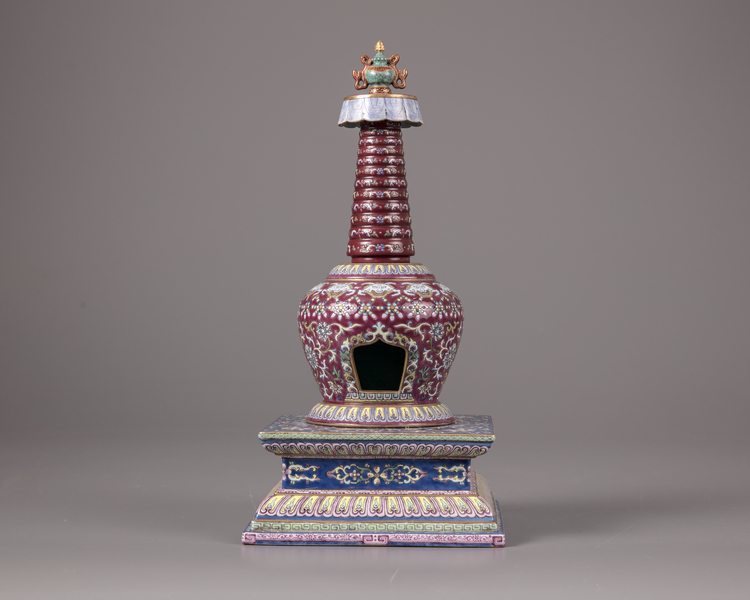 A Chinese ruby red-ground famille rose stupa