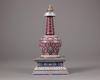 A Chinese ruby red-ground famille rose stupa