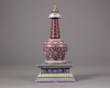 A Chinese ruby red-ground famille rose stupa