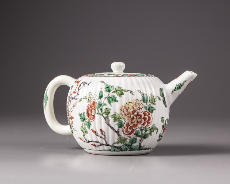 A Chinese famille verte moulded teapot and cover