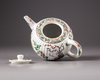 A Chinese famille verte moulded teapot and cover