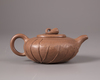 A Chinese yixing 'lotus-leaf' teapot and cover