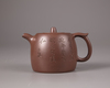 A Chinese yixing teapot and cover