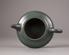 A Chinese green-clay yixing teapot and cover