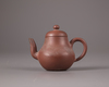A Chinese yixing teapot and cover