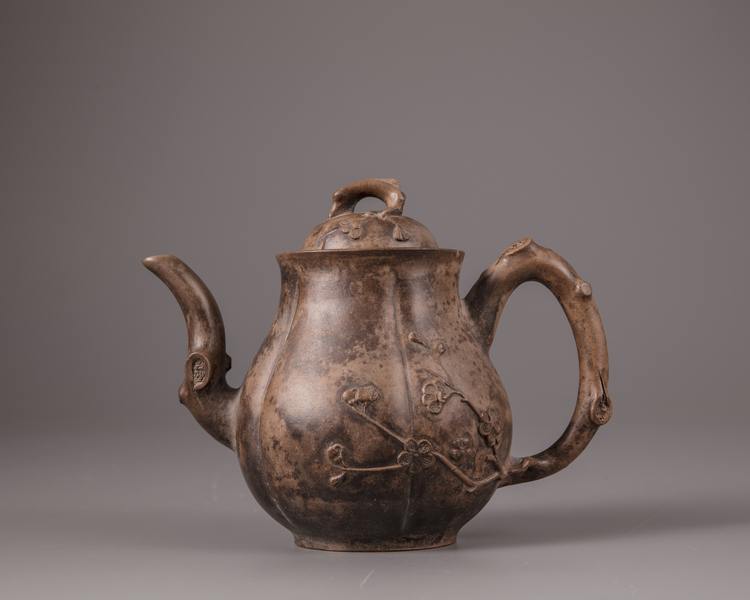 A Chinese yixing 'prunus' melon-form teapot and cover