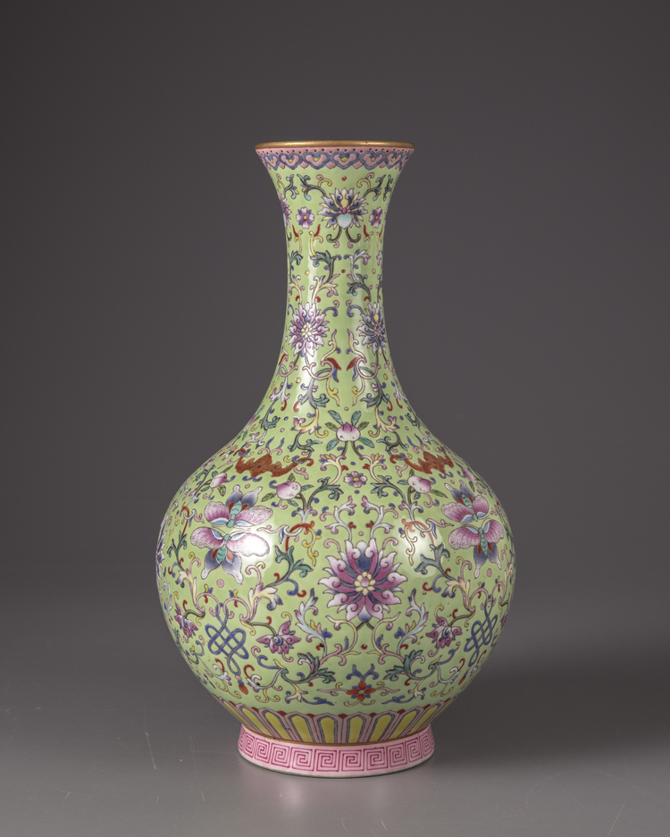 A green-ground famille-rose bottle vase