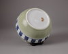 A Chinese celadon-ground blue and white jar