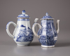 Two Chinese blue and white teapots and covers