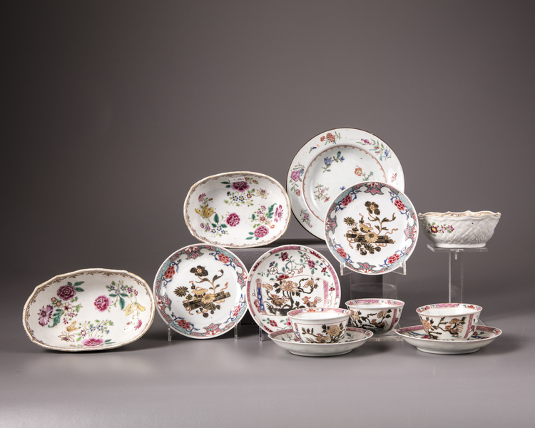 A group of twelve Chinese famille rose bowls, cups and saucers