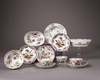 A group of twelve Chinese famille rose bowls, cups and saucers