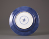 A Chinese powder-blue decorated famille verte dish