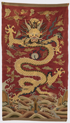 A Chinese red-ground kesi 'dragon' panel