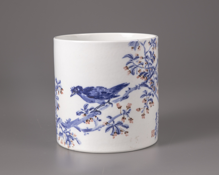 A Chinese blue and white and underglaze red brush pot, bitong