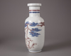 A blue and white copper-red 'Crane and Deer' rouleau vase