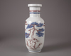 A blue and white copper-red 'Crane and Deer' rouleau vase