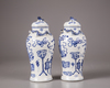 A pair of blue and vases with cover