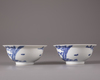 A pair of blue and white bowls