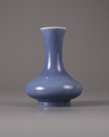 A monochrome blue bottle vase