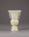 A CHINESE BOWENITE FLATTENED GU VASE, 19TH CENTURY