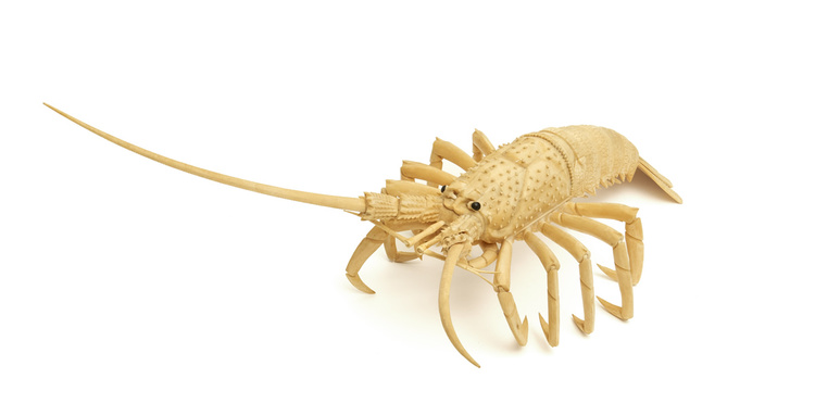An exceptionally large carved bone model of a lobster with movable parts