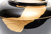 A set of two large black lacquered bowls with cover