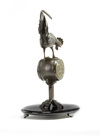 A Japanese figure of a rooster on a stand