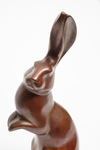 A brown bronze figure of a rabbit
