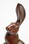 A brown bronze figure of a rabbit