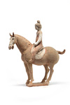 A Chinese painted pottery female equestrian