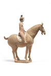 A Chinese painted pottery female equestrian