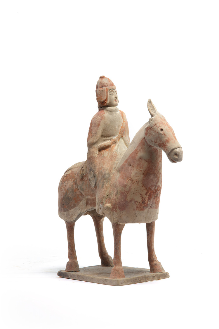 A Chinese painted pottery equestrian