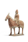 A Chinese painted pottery equestrian