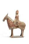 A Chinese painted pottery equestrian