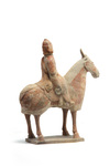 A Chinese painted pottery equestrian