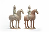 A pair of Chinese pottery equestrians