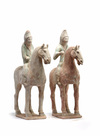 A pair of Chinese pottery equestrians