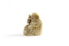 An ivory carving of Budai