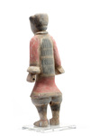 A Chinese painted pottery standing figure of a warrior