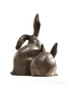 A Japanese wooden carving of two rabbits