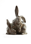 A Japanese wooden carving of two rabbits