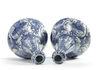 A pair of Chinese moulded blue and white 'Kraak' garlic neck vases