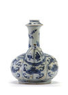 A Chinese blue and white moulded ‘Kraak porselein’ kendi
