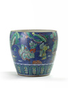 A Chinese blue-ground doucai vase