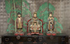 An important and rare set of three polychrome painted wooden figures